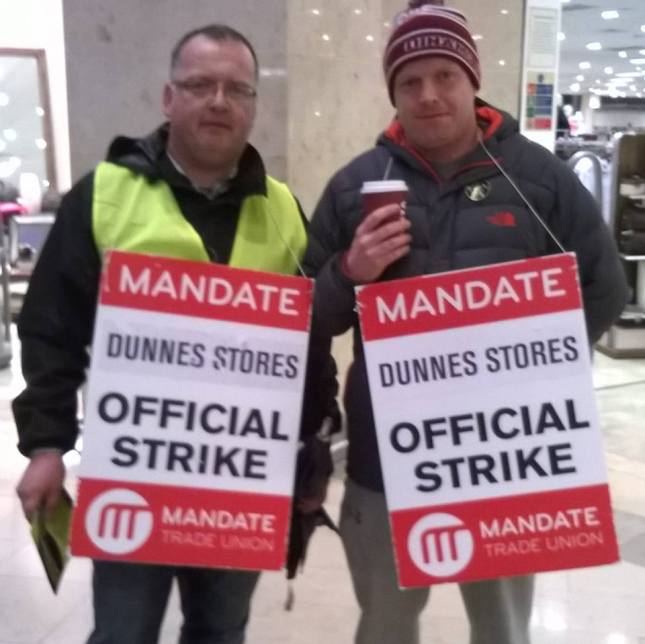 Tony Malone (right) on the picket line last week with Mandate's local rep John Callan